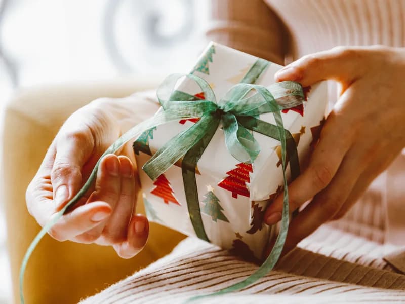 Personalised gifts category with a wrapped gift being prepared